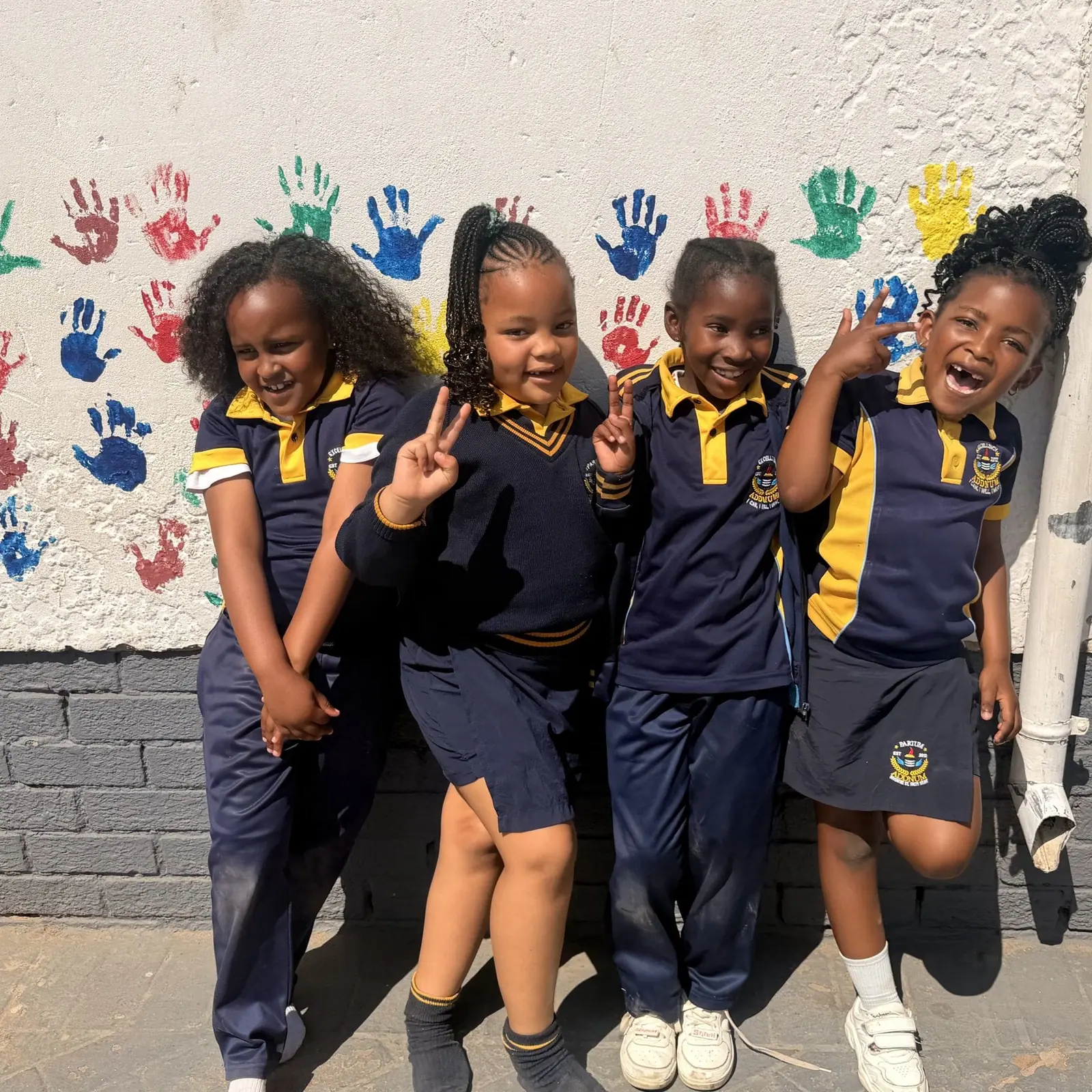 Friends at the handprint wall