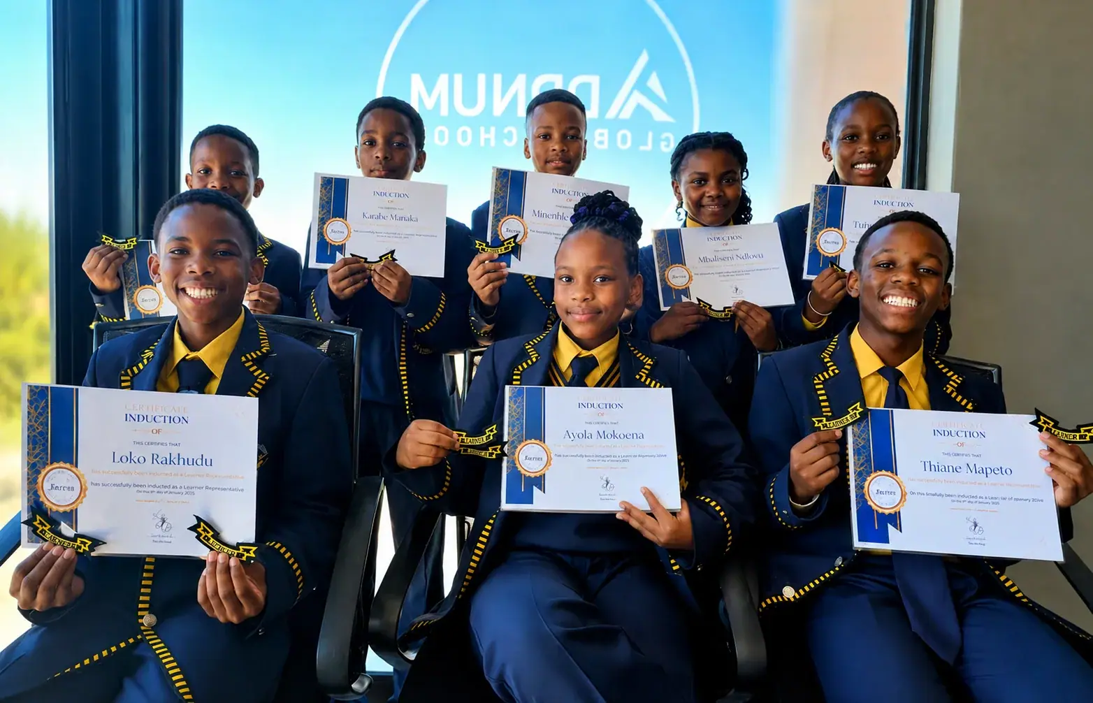 Addnum learner representatives proudly holding their induction certificates